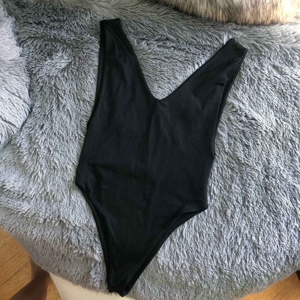 Black low cut/low back cheeky one piece swimsuit